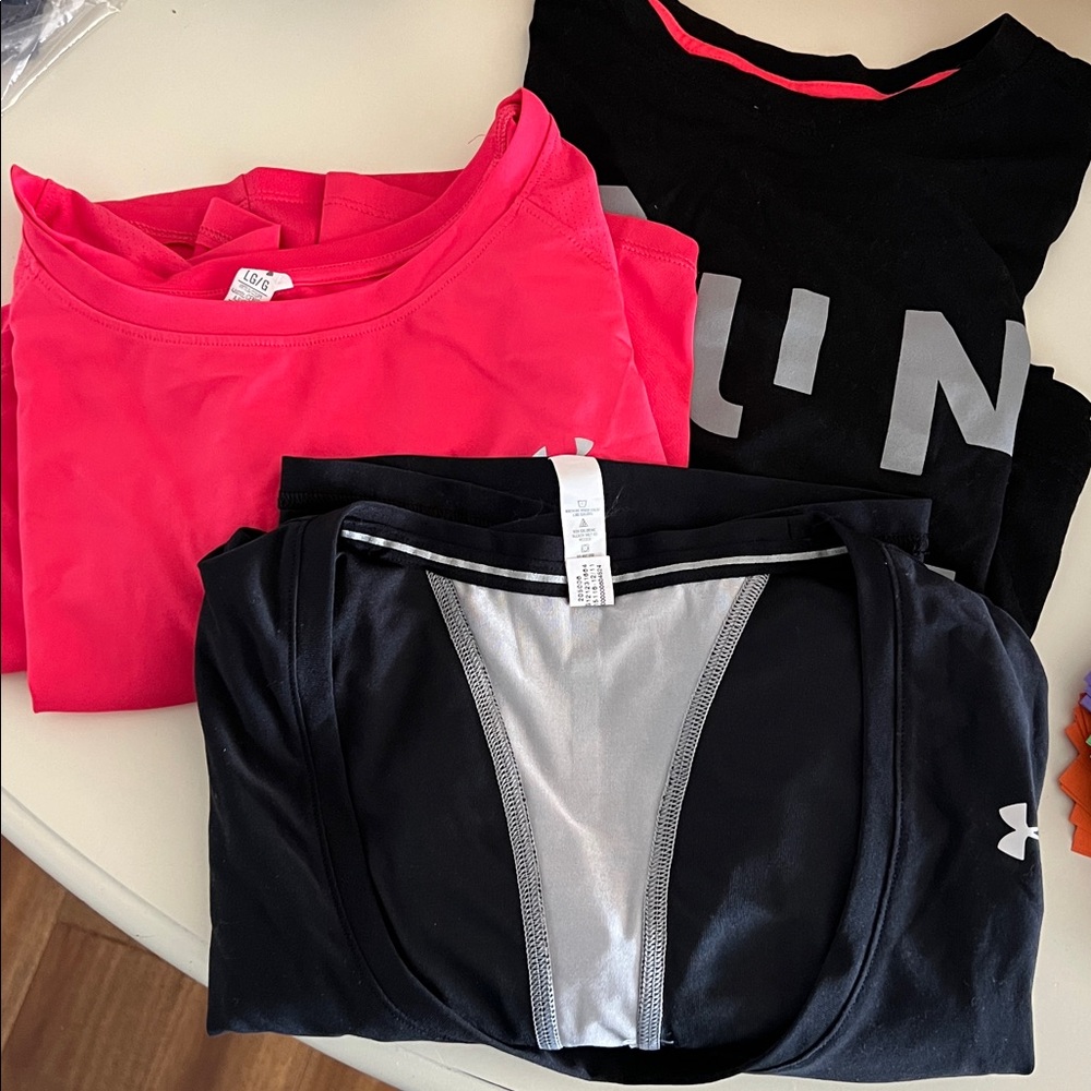 3- woman’s size large T shirts